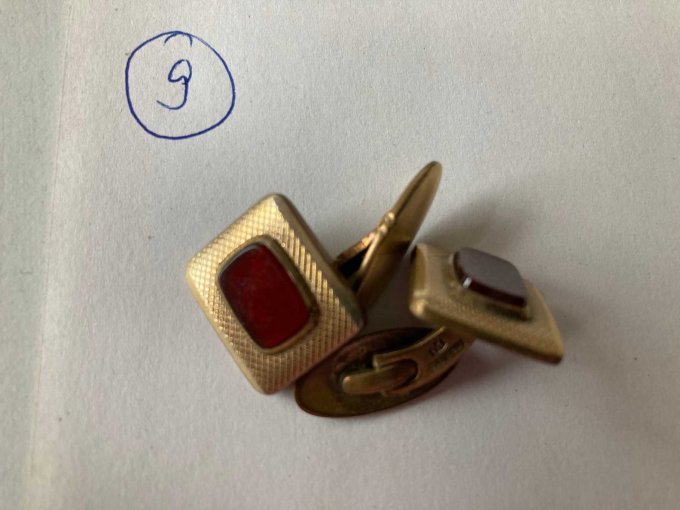 Manschettenknöpfe zu 9)