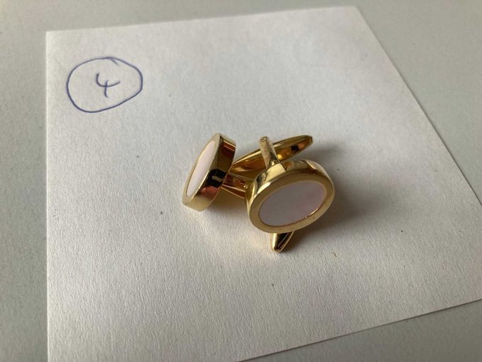 Manschettenknöpfe zu 4)