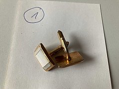 Manschettenknöpfe zu 1)