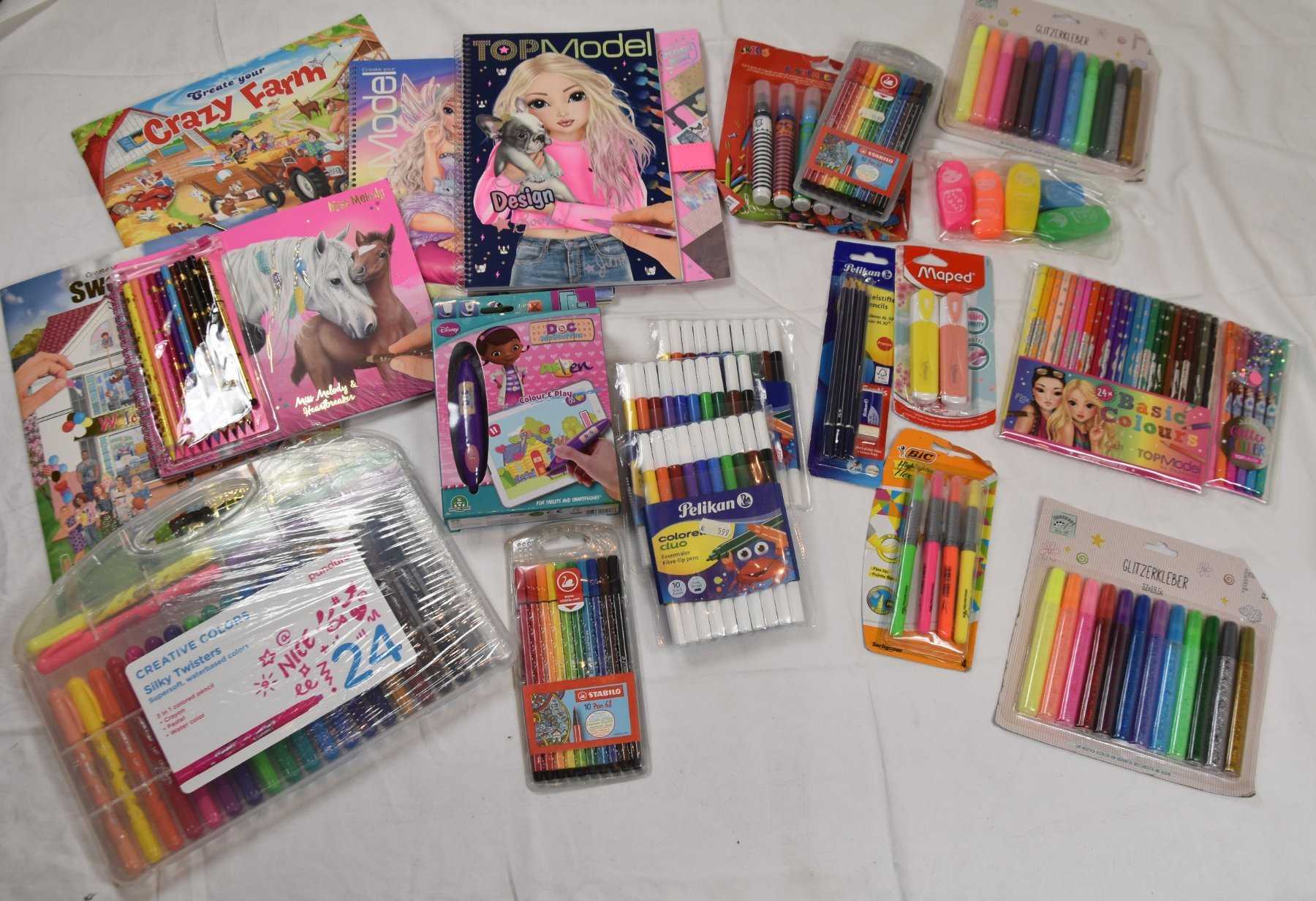 15 different packs of writing instruments and 5 activity books
