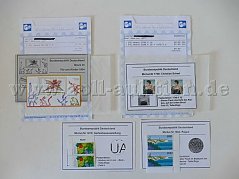 Tüten mit diversen Briefmarken mit Plattenfehlern