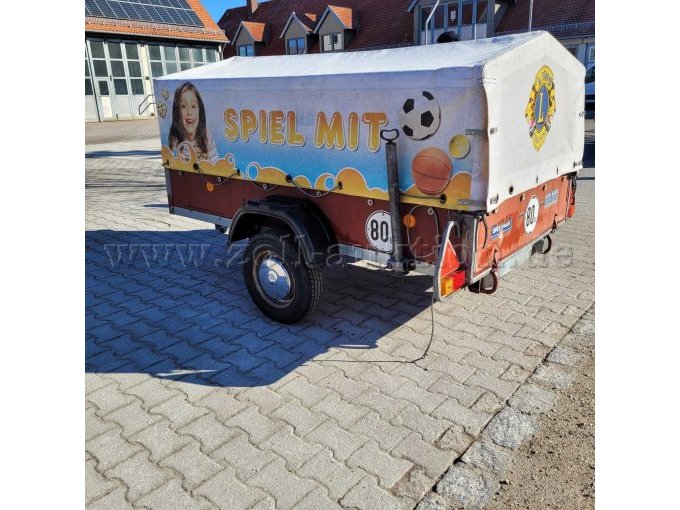 Seitenansicht links mit Plane