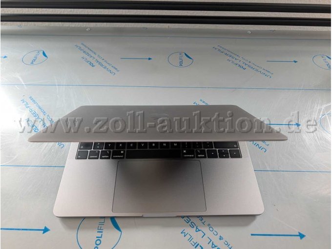 MacBook Halb Zugeklappt