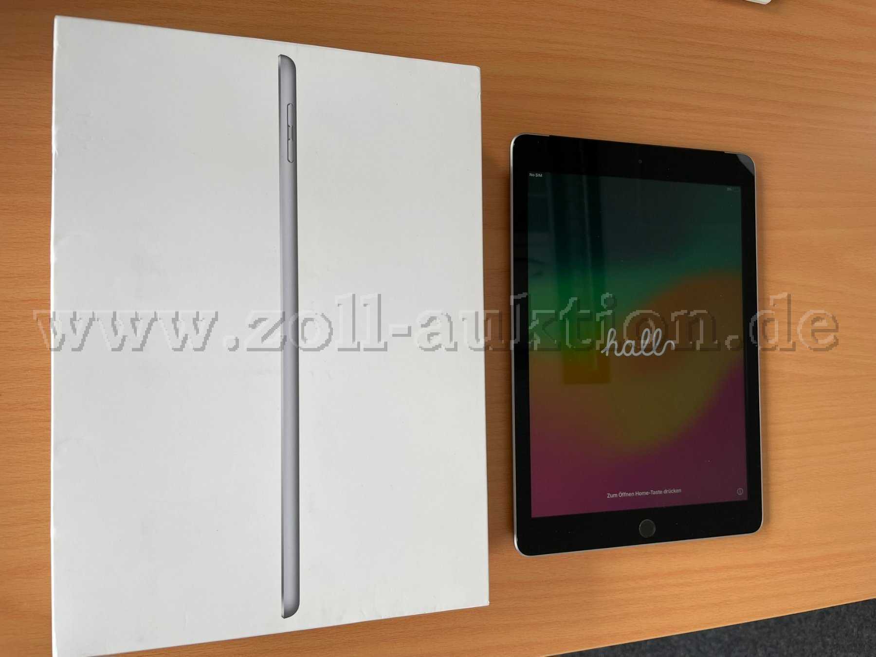 Apple iPad 6. Generation Ansicht von vorne inkl. Originalverpackung