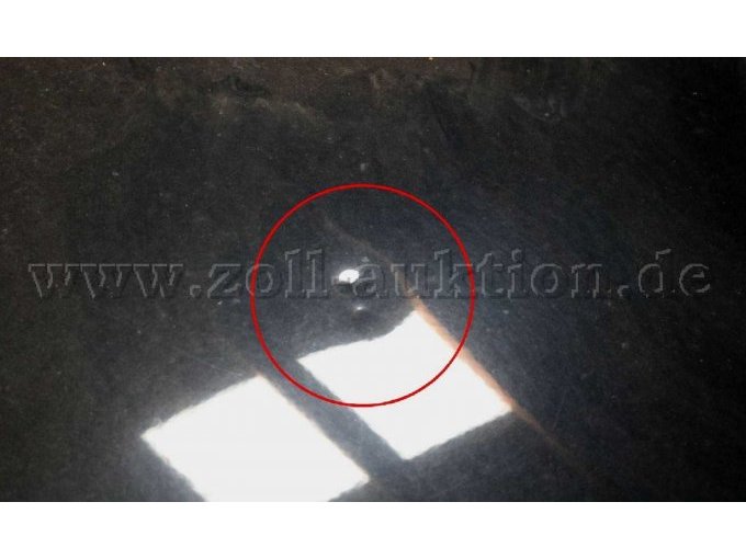 Beschädigung Motorhaube