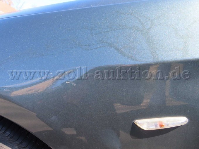 Kotflügel vorne links verkratzt, Lackabplatzer