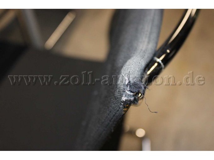 Beschädigung an Stuhlkante