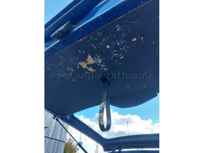 Innenschäden an der Holzverkleidung der Heckklappe