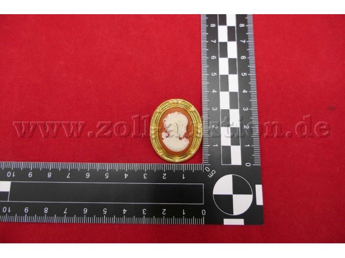 Brosche mit Maßstab