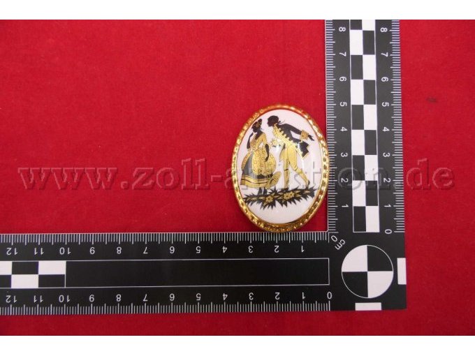 Brosche mit Maßstab