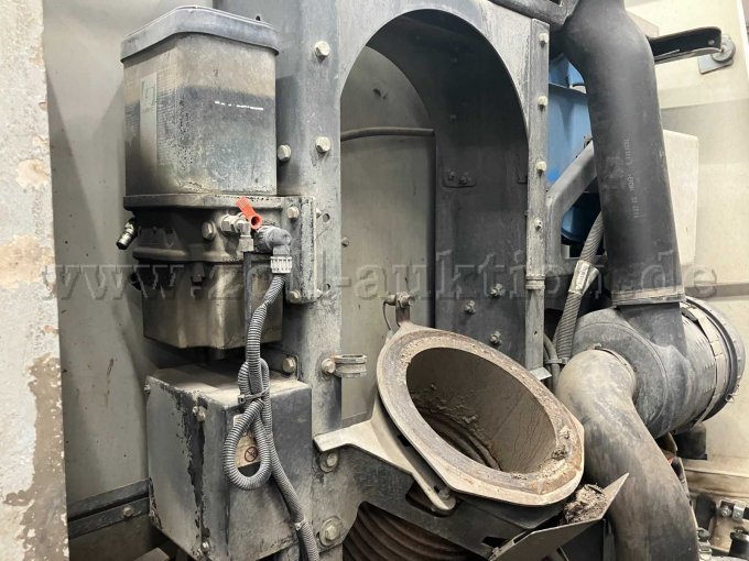 Zentralschmierung und Saugschacht