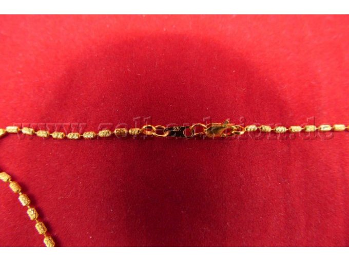 Detailaufnahme der 22 Karat Punzierung mit Verschluss