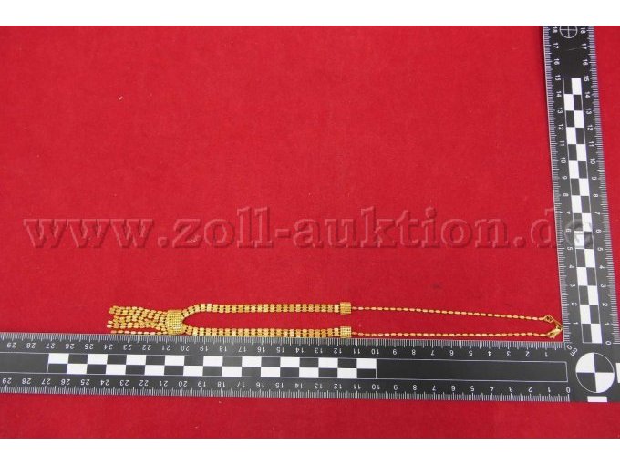 Detailaufnahme der Kette mit Maßstab