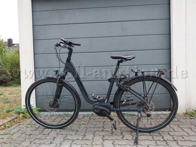 Conway eTS 400 E-Bike, seitliche Ansicht, Sattel, Fahrradständer, Pedalen Conway eTS 400 E-Bike, seitliche Ansicht, Sattel, Fahrradständer, Pedalen