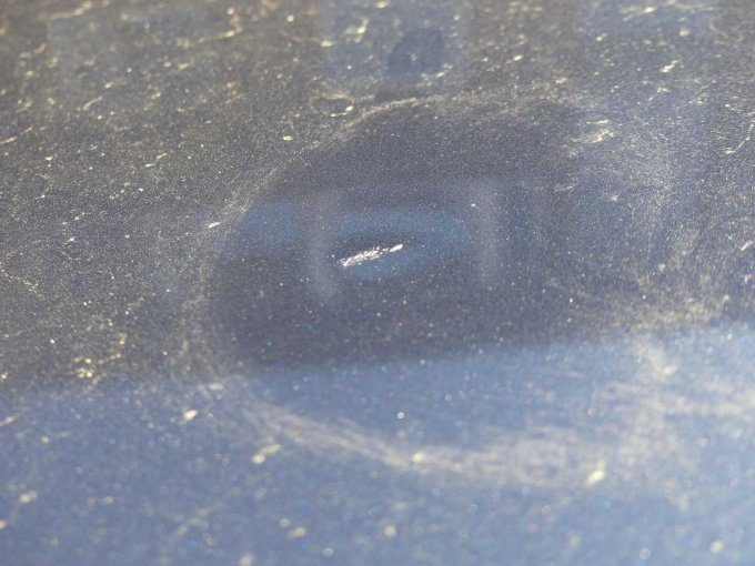 Beispiel Delle mit Lackschaden Fahrzeugdach