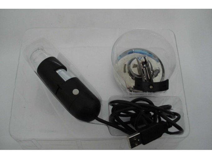 DigiMicro 2.0 Scale mit Standfuß und Kabel in der Verpackung.