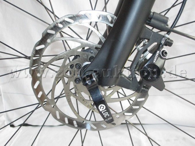 Teilansicht Vorderrad mit Scheibenbremse und Magura Bremssattel