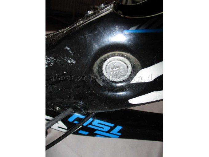 Ansicht Akkuschloss und Lackabplatzungen am Rahmen