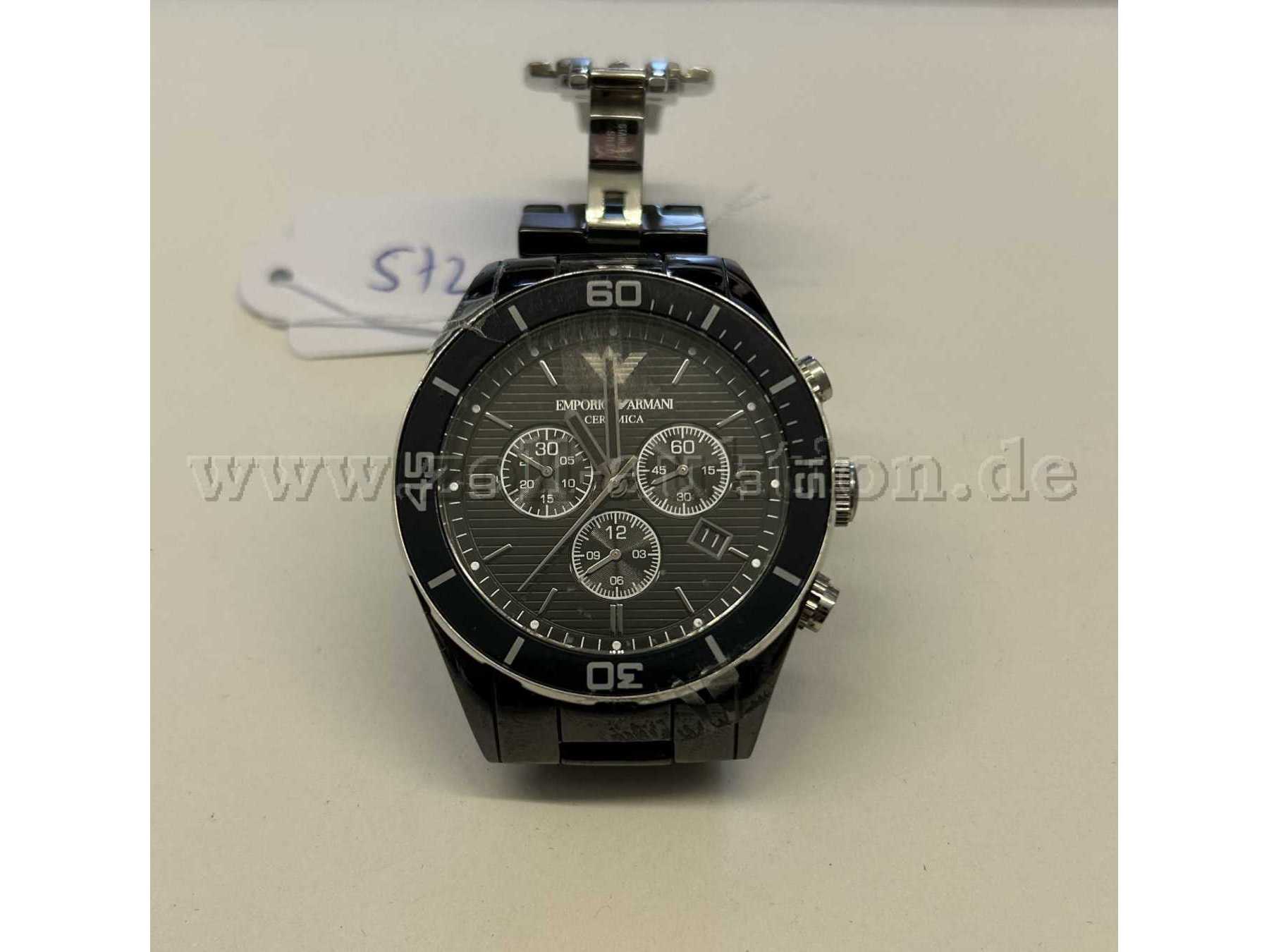 Emporio Armani Ceramica AR1429 111102 Chronograph
Gehäuseboden geöffnet, ohne Funktionsprüfung