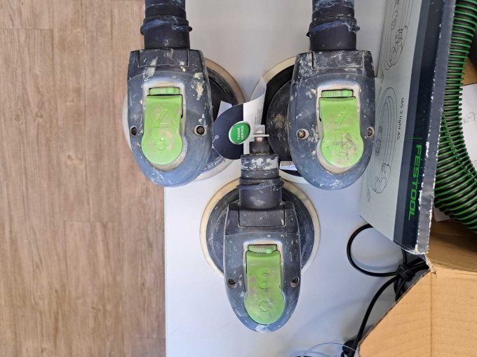 Ansicht der Exenterschleifer von oben mit den aufgedruckten Schleifhub