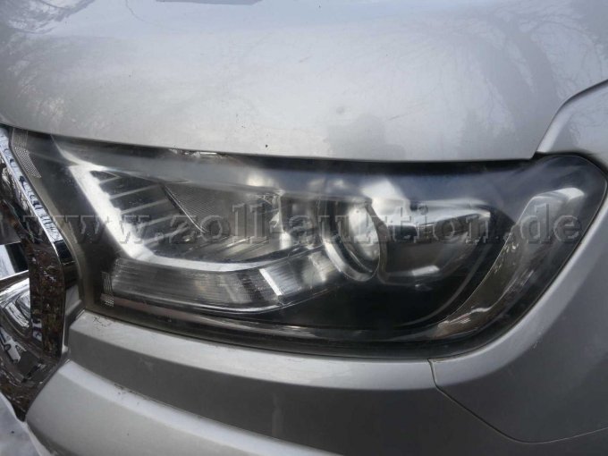 Schweinwerfer Beschädigung