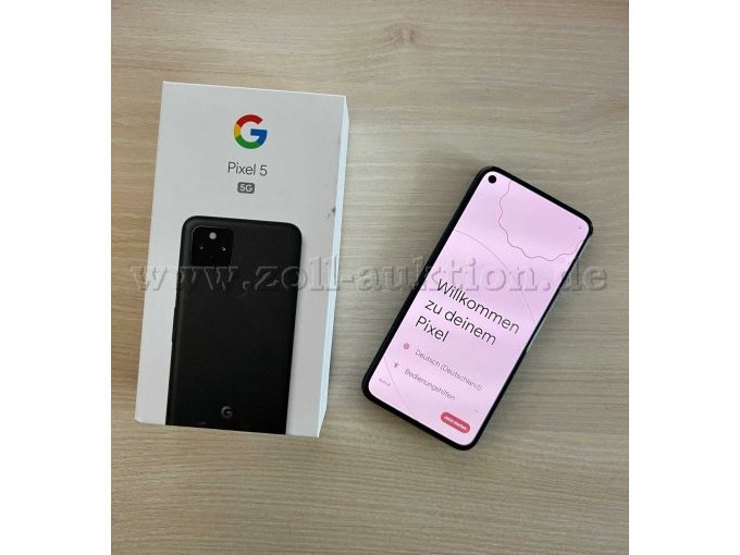 Draufsicht Verpackung und eingeschaltetes Smartphone