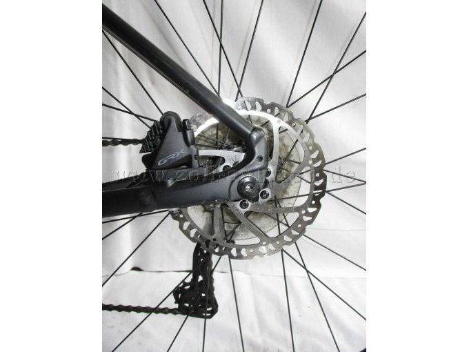 Ansicht Schreibenbremse und Shimano GRX Bremsblock am Hinterrad