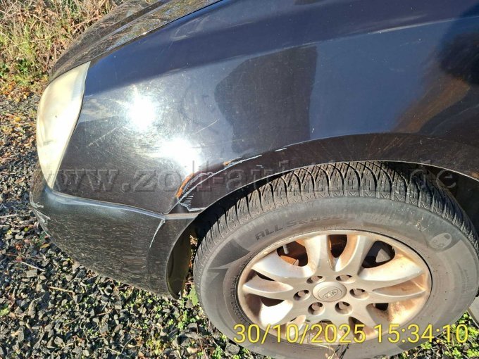 KIA Carnival Radlauf Unfallschaden, Lackschaden Rost