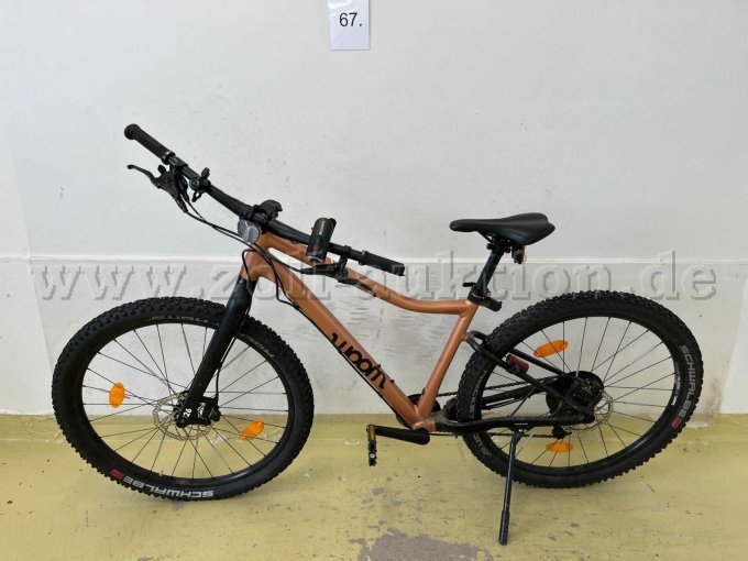 Kinder-Fahrrad von Woom, links