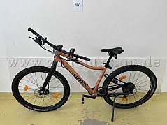 Kinder-Fahrrad von Woom, links