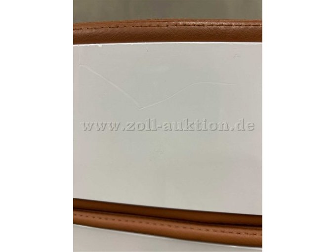 Kratzer im Kunststoff an der Rückenlehne