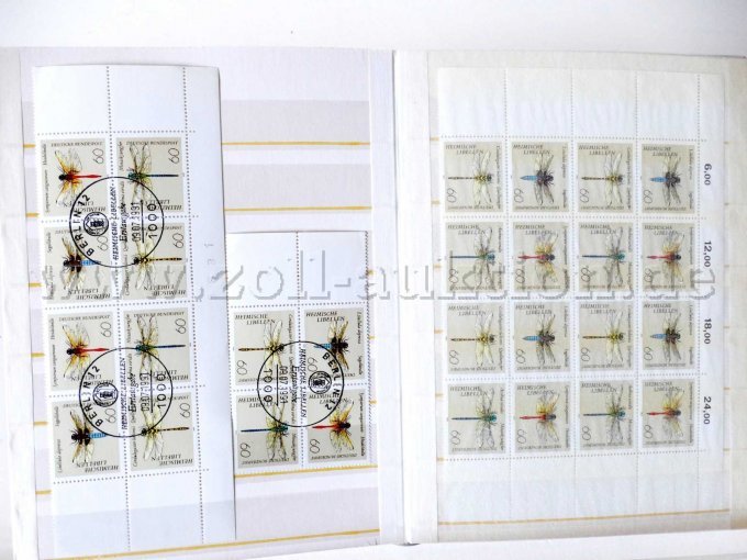 Teilansicht Album, unterschiedliche Briefmarken