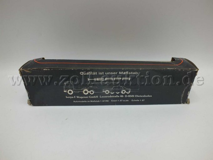 POS 2: Rückseite MAN F8 Pritschenlastzug mit Heckladekran