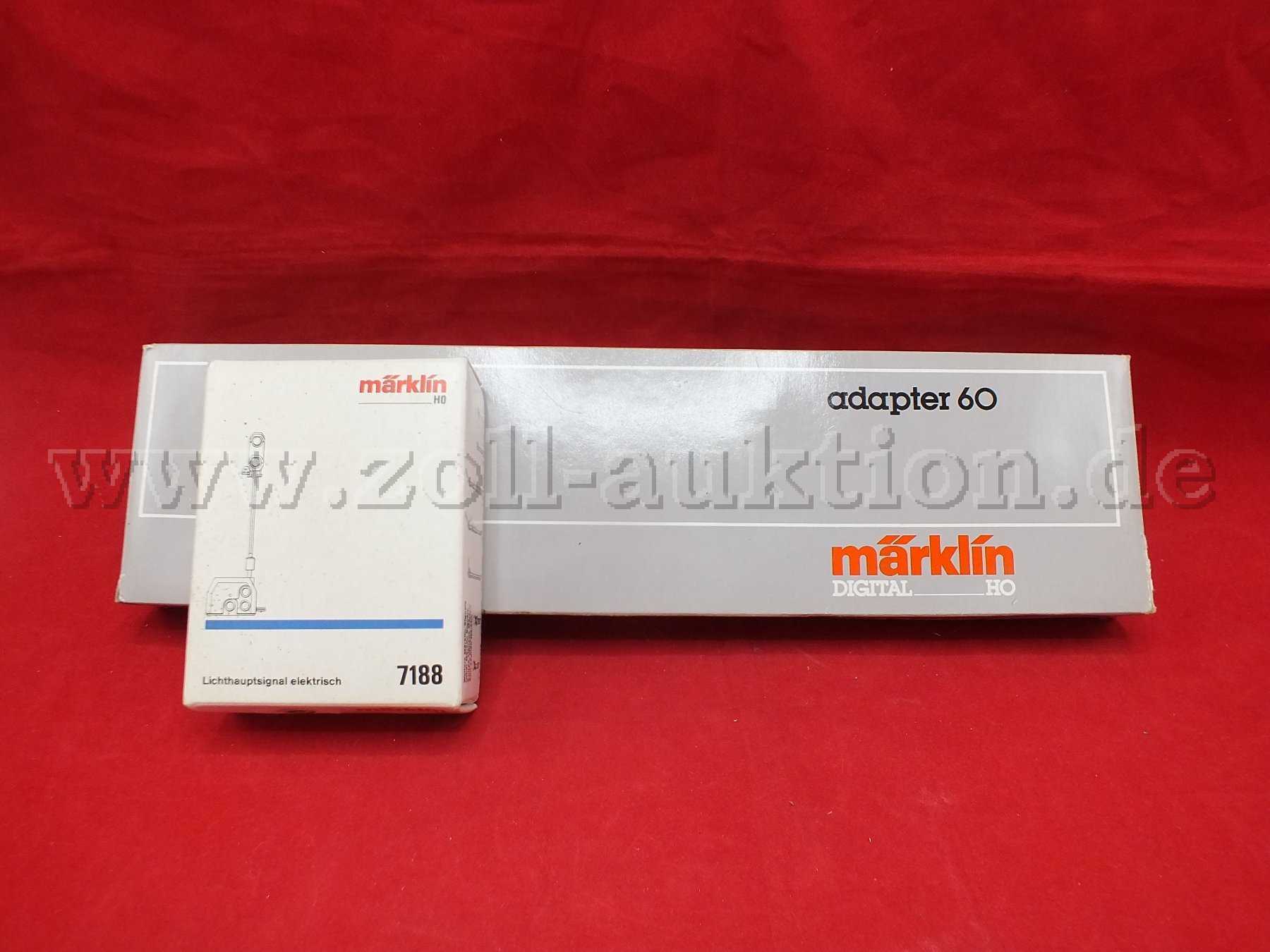 Gesamtansicht der Auktion Märklin 7188 Lichthauptsignal und Märklin 6039 Digital- Adapter in OVP mit Beschädigungen