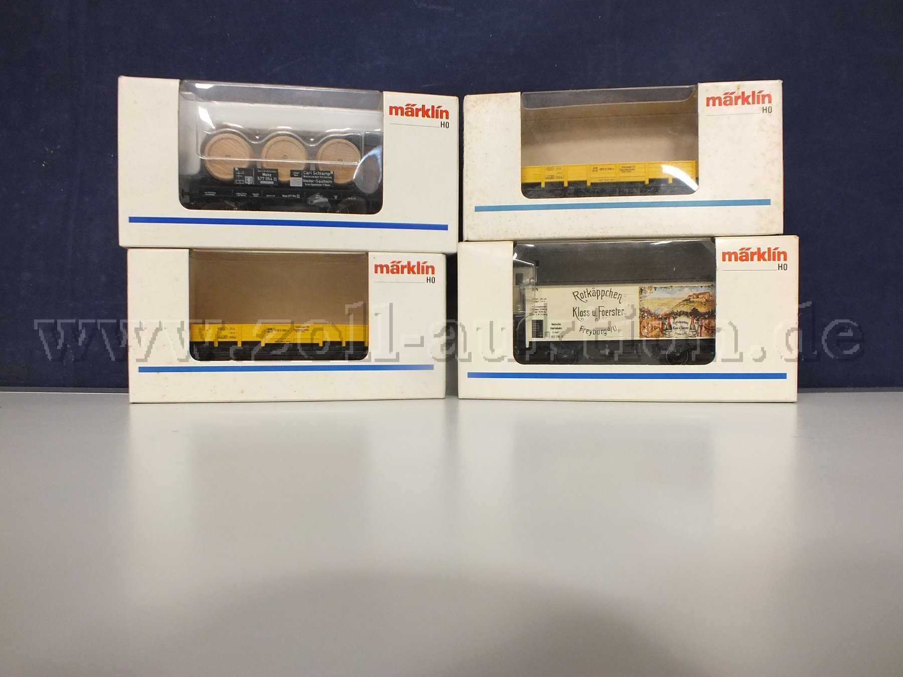 Gesamtansicht der Auktion Märklin verschiedene Güterwagen Spur H0 in OVP mit Beschädigungen