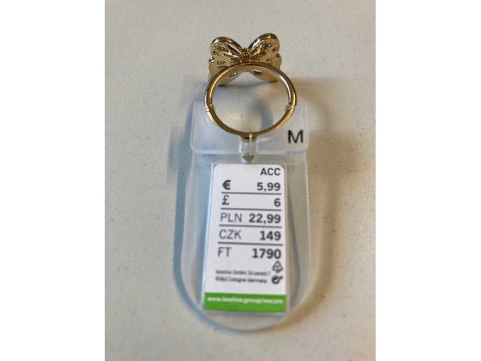 goldfarbener Ring mit Schmetterlingsmotiv - Rückseite Etikett