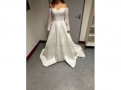 Hochzeitskleid
Allienna Couture
AC 208 
Ivory
Größe 38