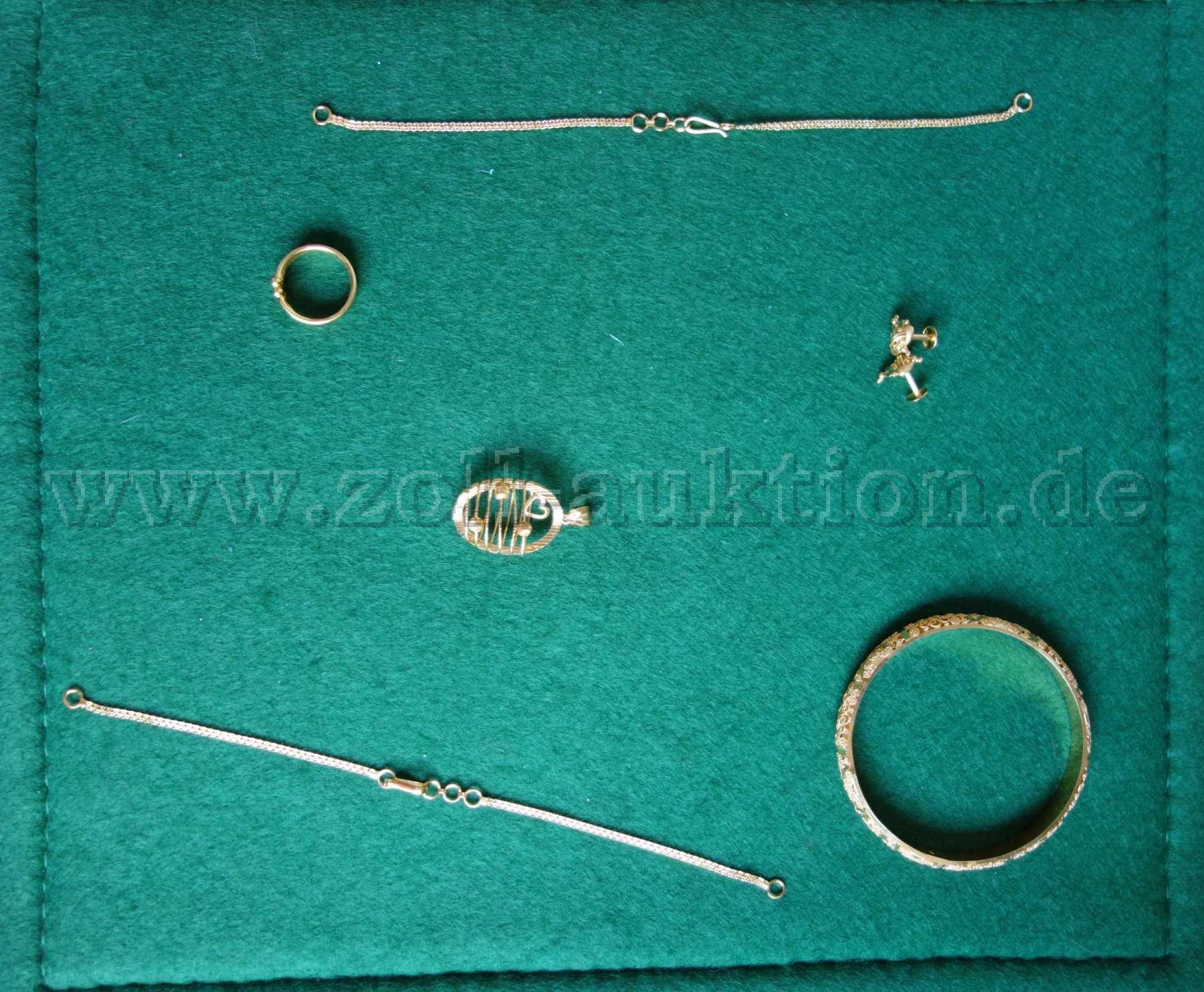 1 Konvolut u.a. aus Ohr- und Armschmuck, Anhänger, Ring 916/- GG / 22 Karat