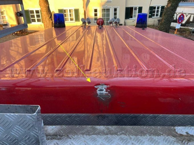 eingedellt am Dach Fahrerhaus