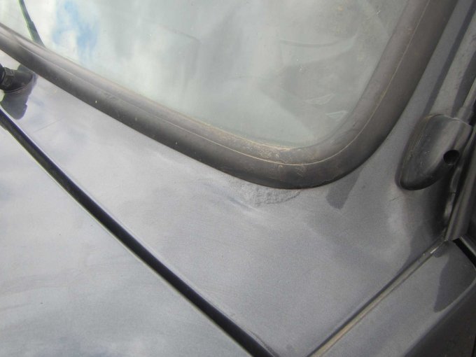 Roststelle frontscheibe links unten