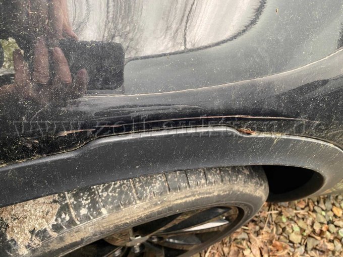 Beule Kotflügel links