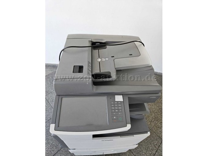 -Ansicht des Druckers von schräg oben. Kleinere Kratzer auf dem Gehäuse vorhanden. Anschaltknopf abgeklebt. Touchscreen in gutem bis sehr gutem Zustand.