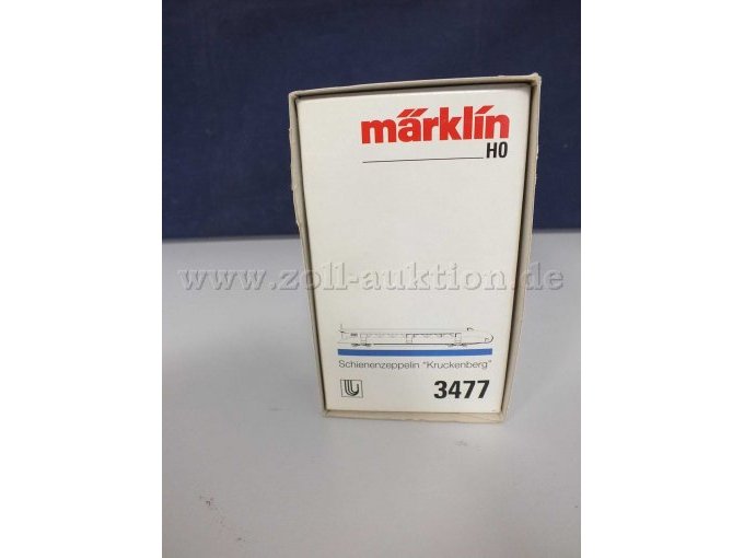 Seitliche Ansicht von links der OVP mit Typenbezeichnung und Beschädigungen