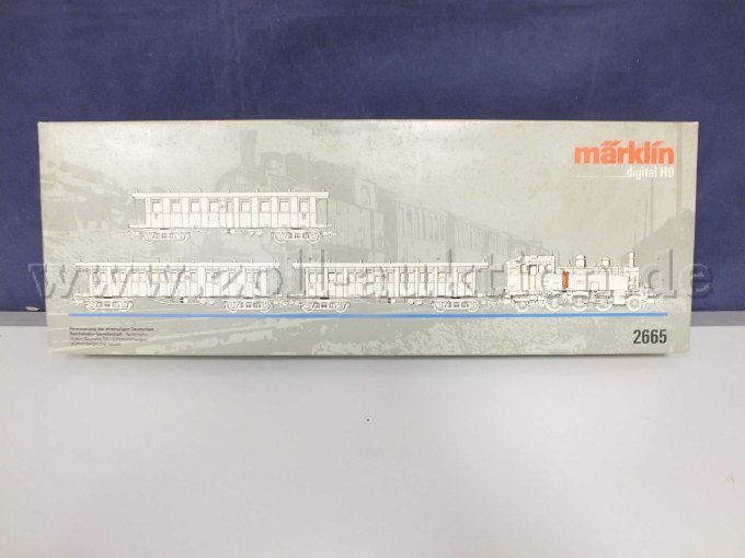 Vorderansicht der OVP mit Angaben zum Set und Beschädigung