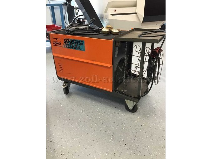 Ansicht von Hinten mit Rolle zum Aufwickeln des Stromkabels und Kette zur Absicherung der Gasflasche (Gasflasche ist nicht auf dem Bild und gehört nicht zur Auktion)