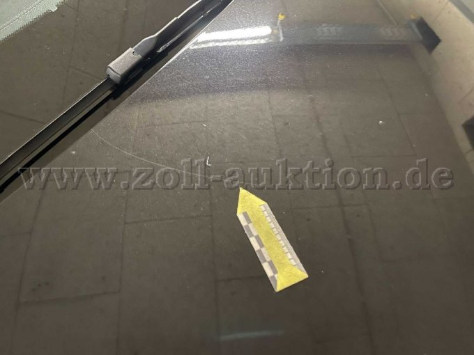 Motorhaube verkratzt