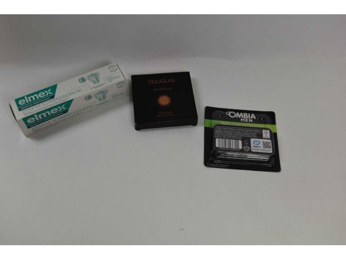 1 Packung Ersatzklingen „Ombia“ Men, 1 Zahncreme „elmex" & 1 Big Bronzer „Douglas“