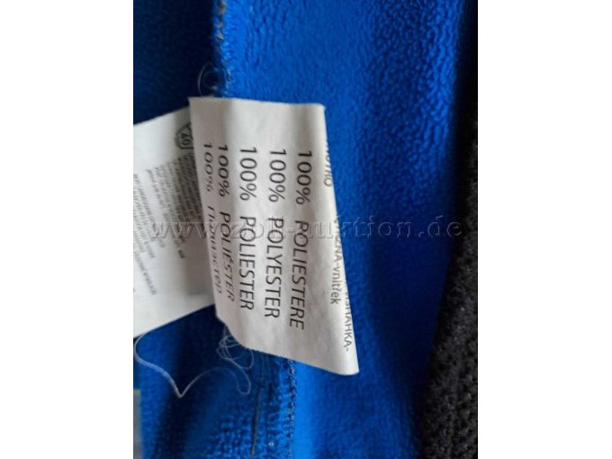 Schild aus welchem Material die Jacke besteht