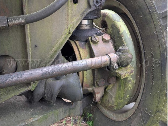 Bagger T174-2 Hinterachse, Rad mit loser Staubschutzmanschette