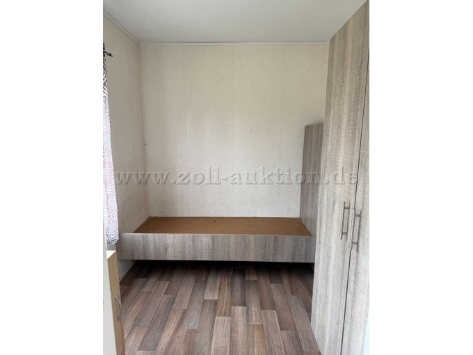 Schlafzimmer mit Möblierung